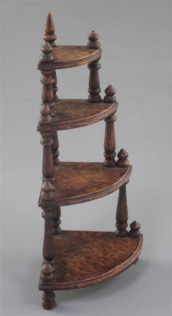 Denis Hillman. A Victorian stained beech four tier miniature bowfronted corner whatnot, height 5in.